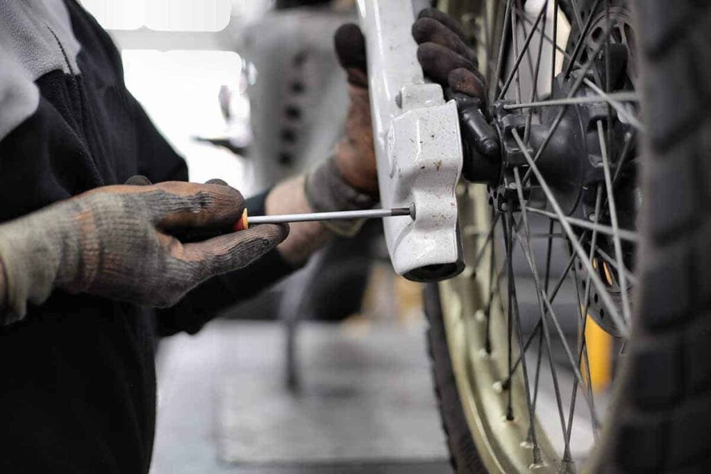 Perform-wheel-alignment-motorcycle