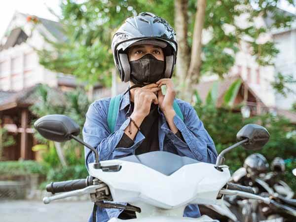 Wearing-a-Mask-on-a-Motorcycle-agvsport (1)