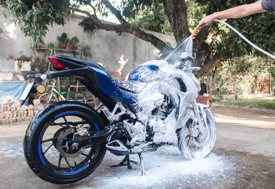 What materials to avoid when cleaning a motorcycle