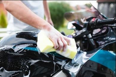 What should you not wash a motorcycle with