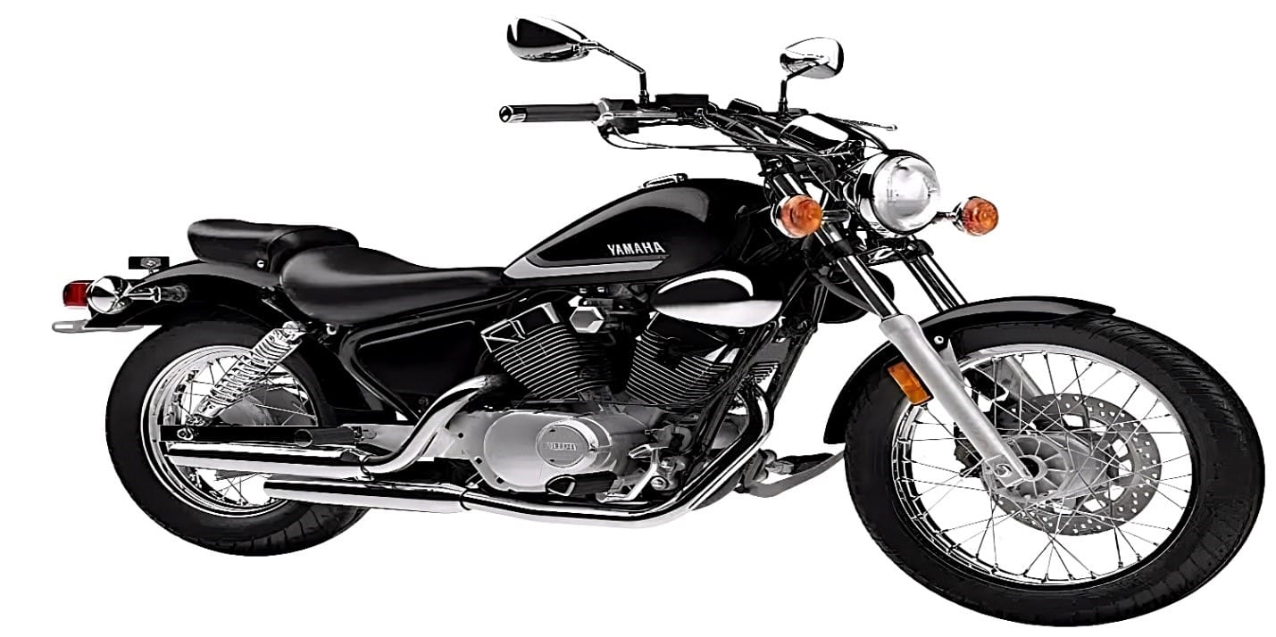 A sleek black Yamaha V Star 250 motorcycle parked on a city street. The bike features a 250cc engine, comfortable seating, and a smooth ride perfect for both highway and city riding. An excellent choice for entry-level riders.